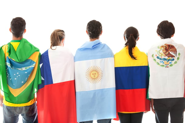 Group of Latinamerican people with the flags - isolated over a white background