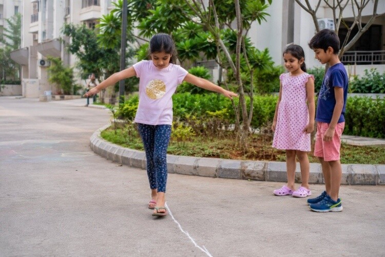 Balance beam using chalk lines or a low curb