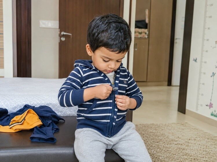 Velcro and zips on their own clothes