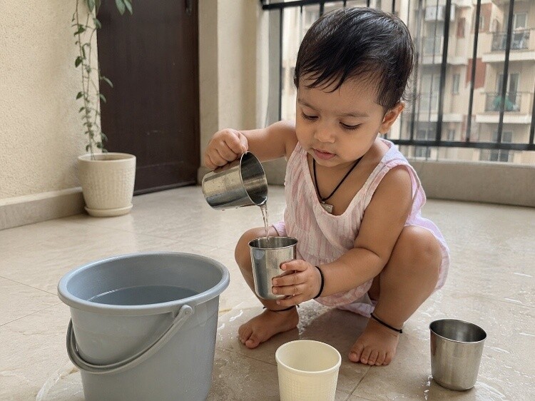 Water and cup transfer play